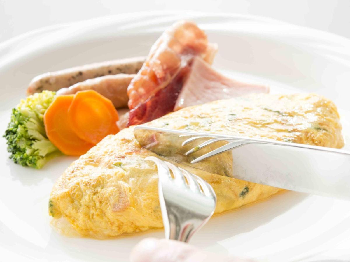 Hotel Okura Jr Huis Ten Bosch Sasebo Exterior foto An omelette with ham and sausages