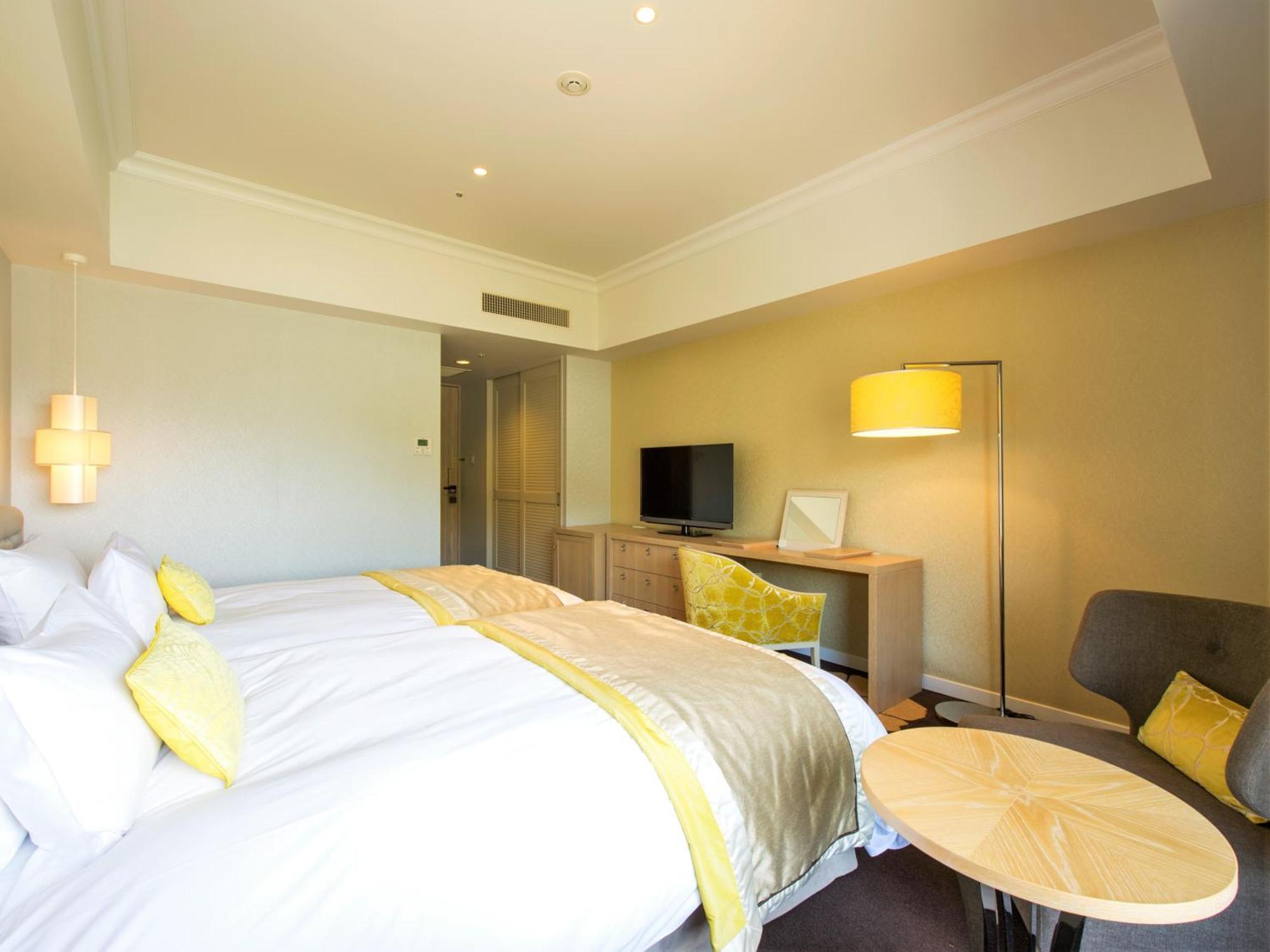 Hotel Okura Jr Huis Ten Bosch Sasebo Exterior foto A room at the hotel